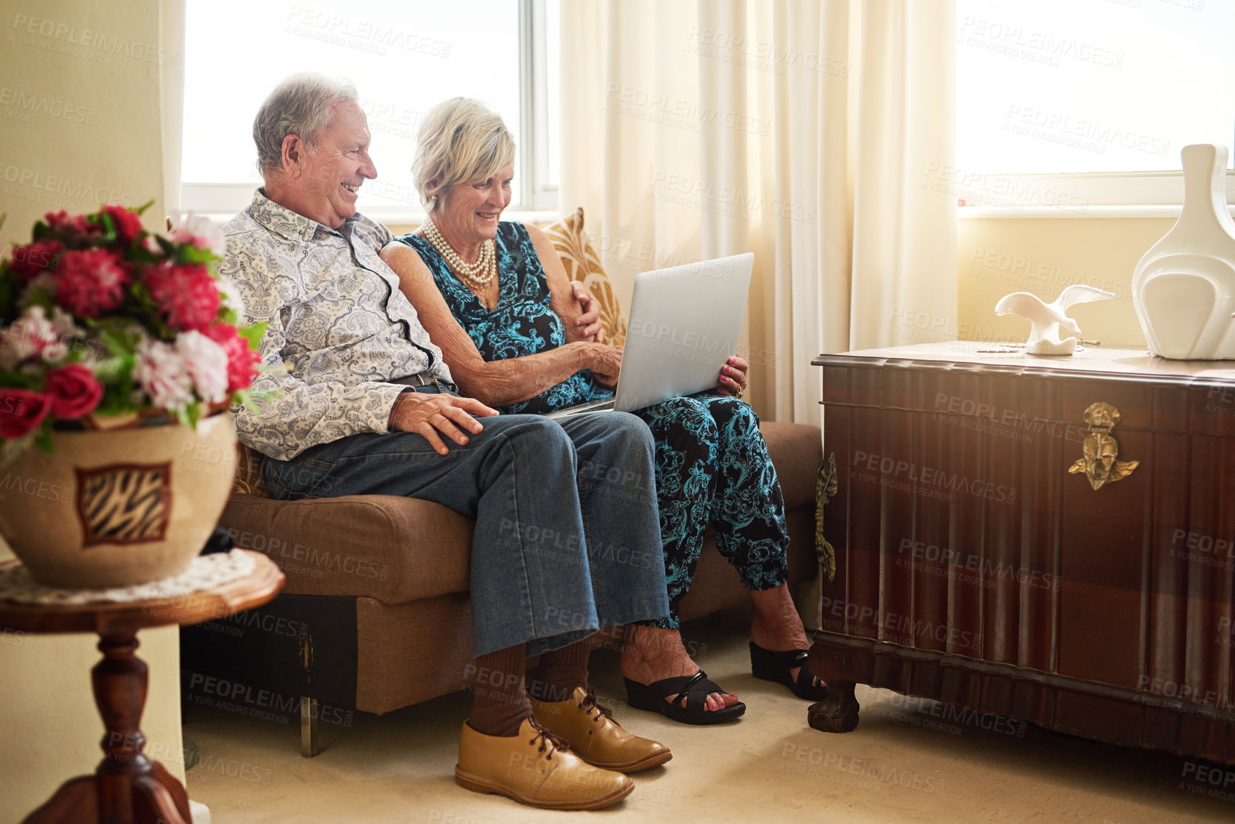 Buy stock photo Elderly, couple and relax with laptop in house for watching movie, streaming film and bonding on retirement break. Happy, senior people and digital with love for entertainment, subscription or lounge
