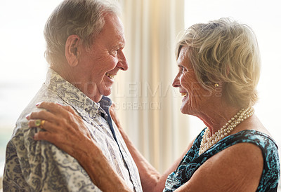 Buy stock photo Dance, music and smile with senior couple in living room of retirement home for bonding or security. Anniversary, fun or love with elderly man and woman in apartment together for safety or trust
