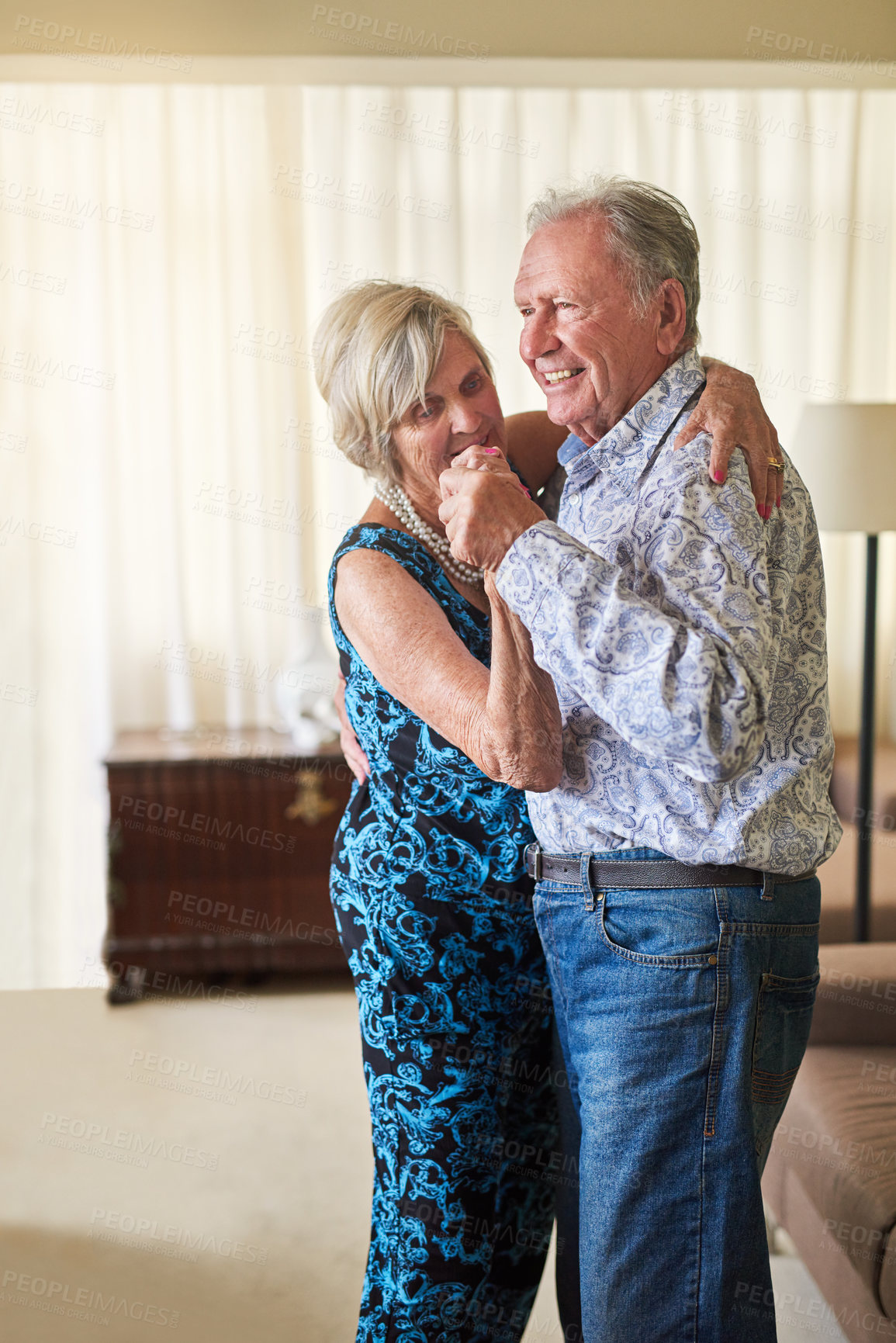 Buy stock photo Anniversary, dance and smile with senior couple in living room of retirement home for bonding or security. Fun, love or music with elderly man and woman in apartment together for safety or trust