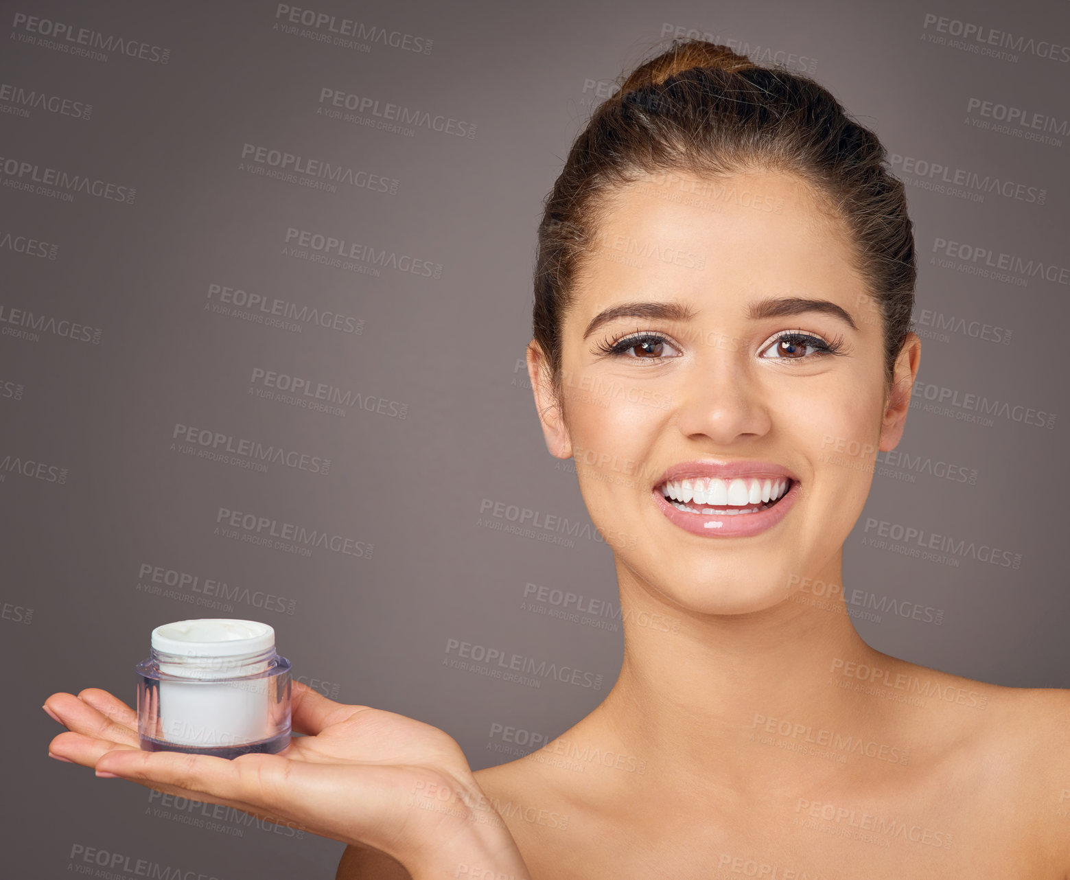 Buy stock photo Cream, skincare and portrait of happy woman in studio for beauty, wellness and facial treatment on gray background. Dermatology, salon and person with moisturizer jar, lotion and anti aging cosmetics