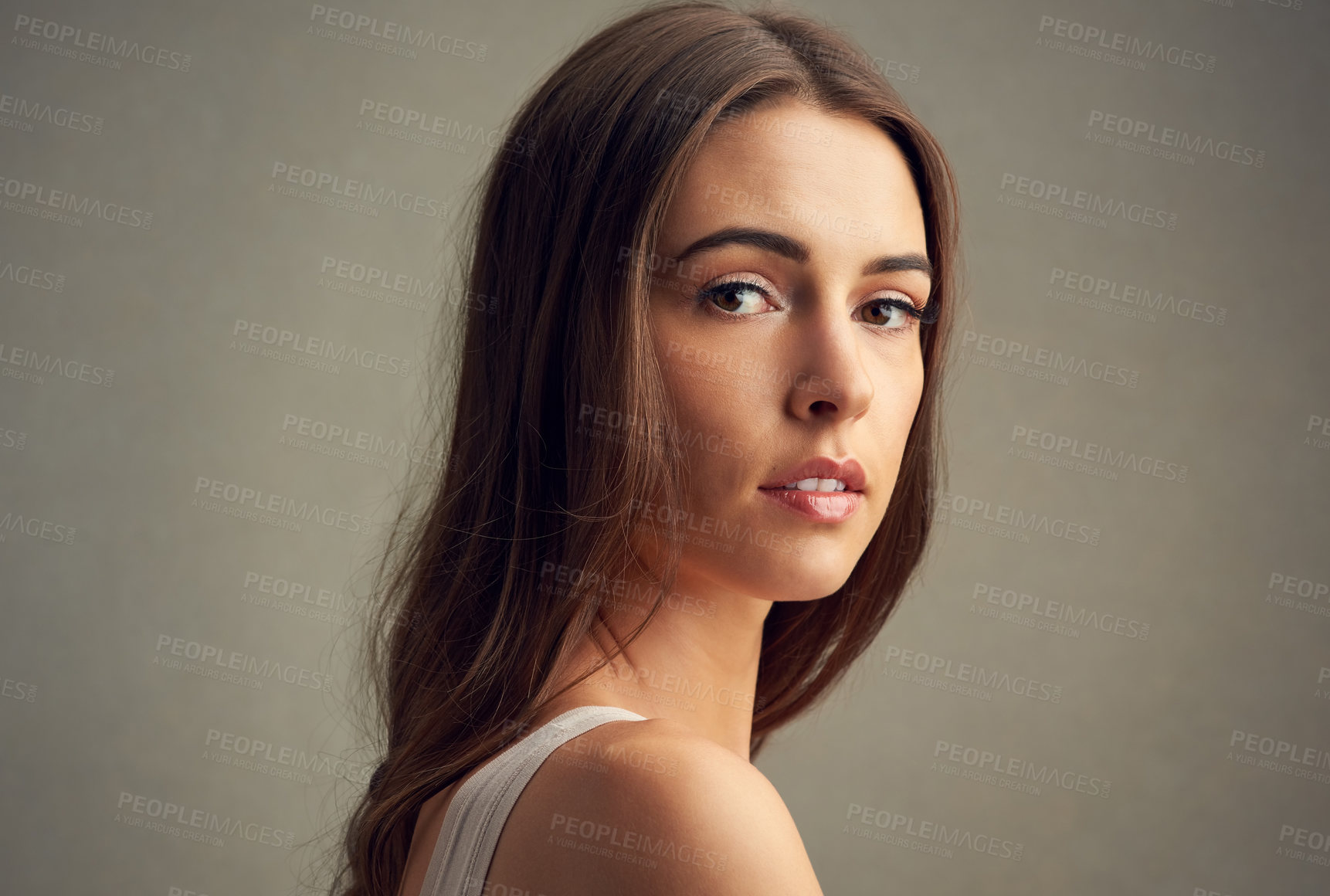 Buy stock photo Studio, growth and girl in portrait for hair care, collagen and treatment with benefits for healthy texture. Woman, cosmetics and shine for shampoo with pride, beauty and natural by brown background