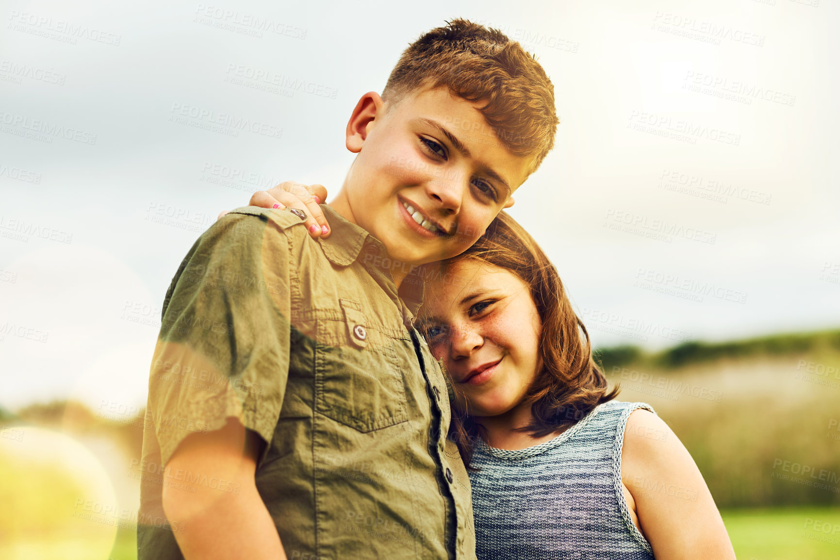 Buy stock photo Portrait, kids and hug with smile in park together for support, bonding and playing in summer. Siblings, boy and girl in nature, garden and countryside for fun games as childhood development