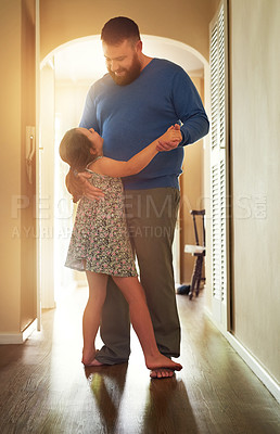 Buy stock photo Dad, girl or dancing in home on feet for youth, growth or development with role model. Father, happy dancer or playful in house for learning or bonding, superhero parent with hand for teaching move