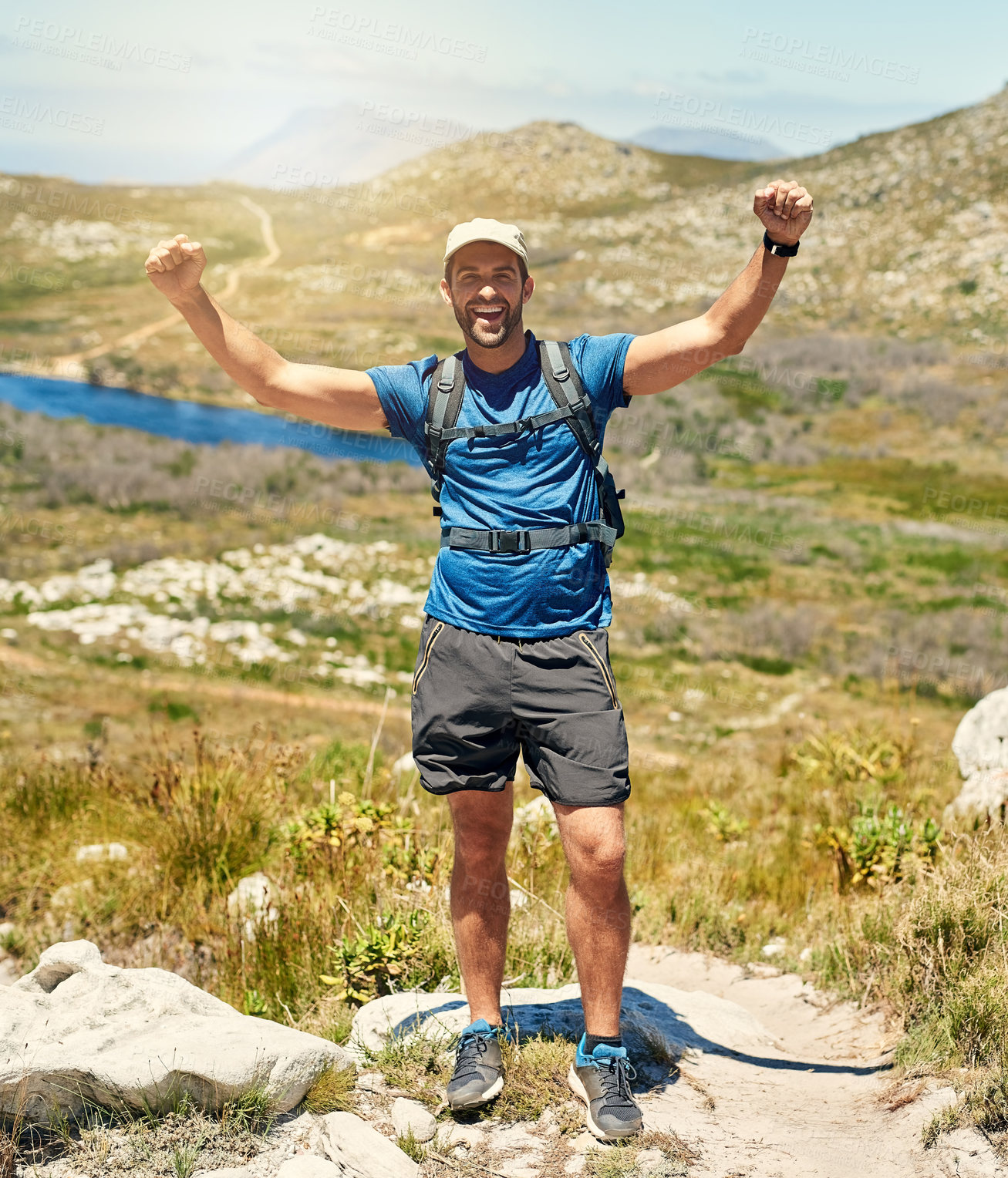 Buy stock photo Portrait of a young man celebrating while out on a hike