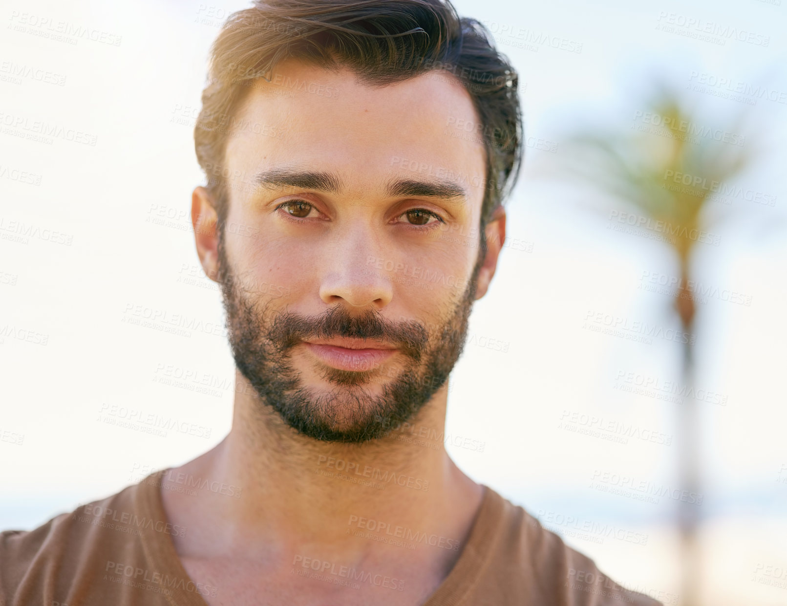 Buy stock photo Summer, holiday and portrait of man with travel, peace or relax at beach for outdoor adventure. Happy, face and closeup of confident person on tropical island for fun vacation in nature with blue sky