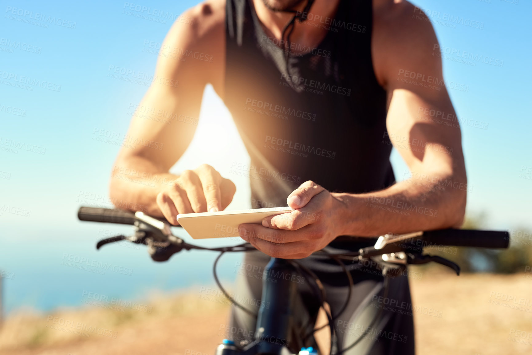 Buy stock photo Mountain bike, hands or cyclist outdoor with cellphone for fitness, tracking distance and map for direction guide. Nature, man and bicycle for exercise, training and mobile for wellness app by flare