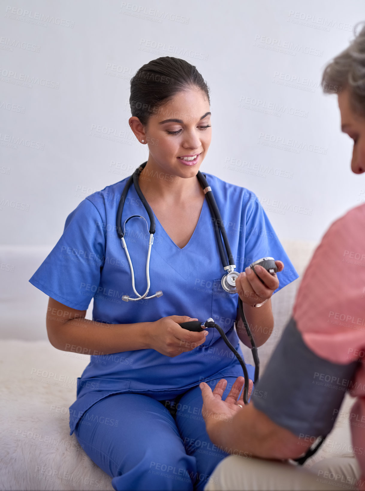 Buy stock photo Blood pressure, woman and doctor in hospital for routine healthcare, heart rate or hypertension appointment for wellness. Medic, diabetes patient and medical exam to check pulse, results or advice

