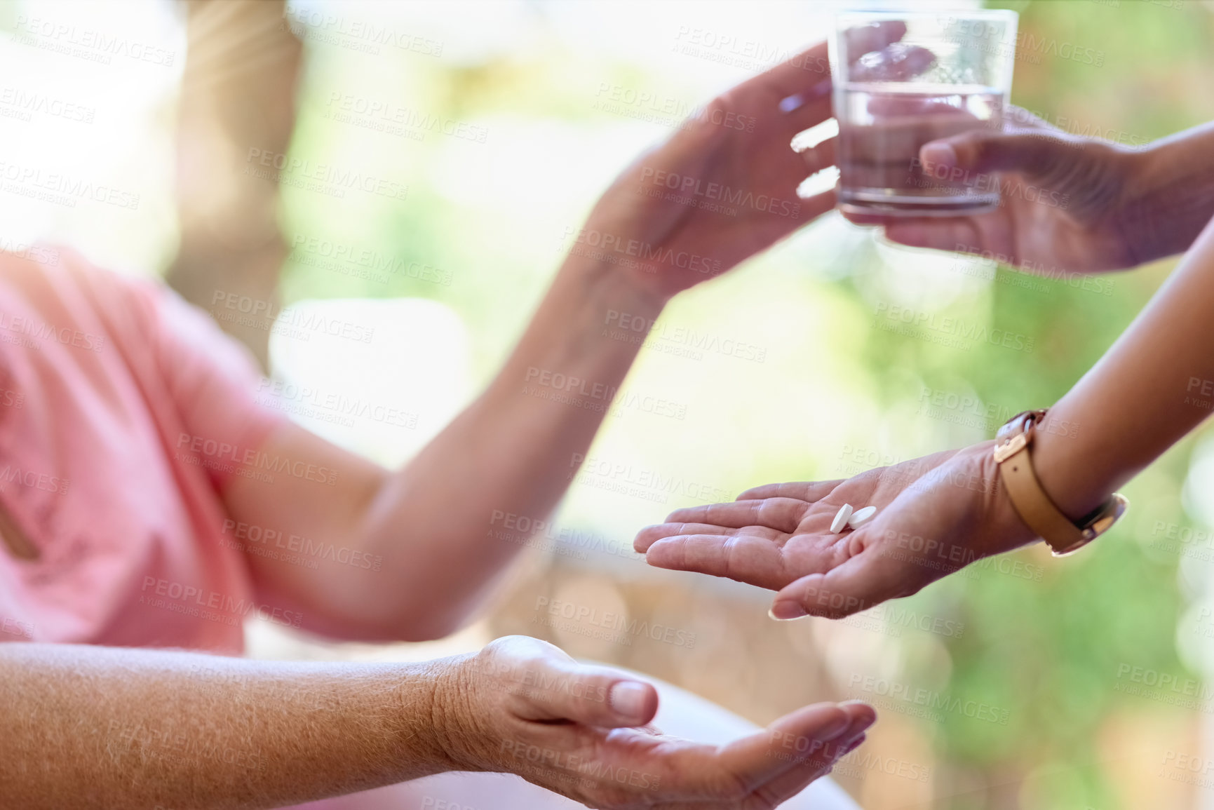 Buy stock photo Medicine, woman and hand with water at nursing home of patient medical treatment, supplements or support of healthcare. People, caregiver and prescription pills, drugs or glass for health diagnosis

