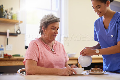 Buy stock photo Smile, caregiver and woman with tea in nursing home kitchen for breakfast, relax and healthy nutrition of support. Nurse, patient and food for senior care with helping, trust or serving at retirement