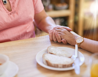 Buy stock photo People, holding hands and support in nursing home for help, trust and hope in living room. Women, comfort and senior care at wooden table for grief counselling, empathy and assistance in retirement