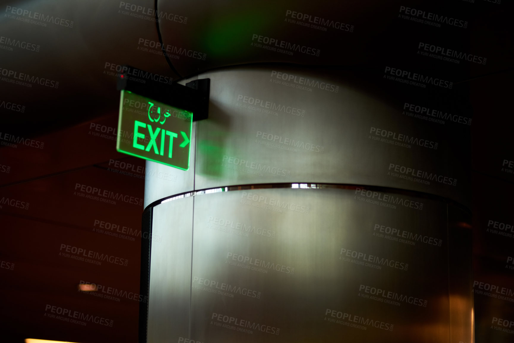 Buy stock photo Exit, sign and parking garage, guide and arrow for direction in airport for transport and dark in basement. Dubai, security and low angle, night and storage of car for protection and safety.