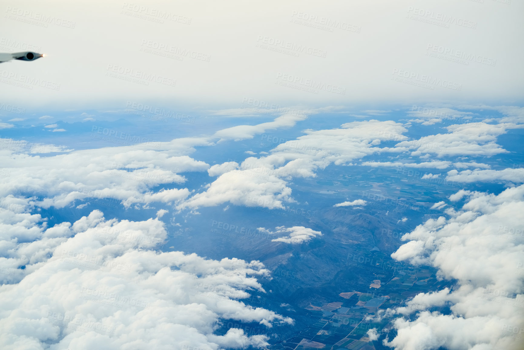 Buy stock photo Clouds, aerial view and nature from window of airplane for travel with calm sky scenery. Flight, journey and high angle of outdoor weather from aircraft for adventure, destination or holiday abroad.