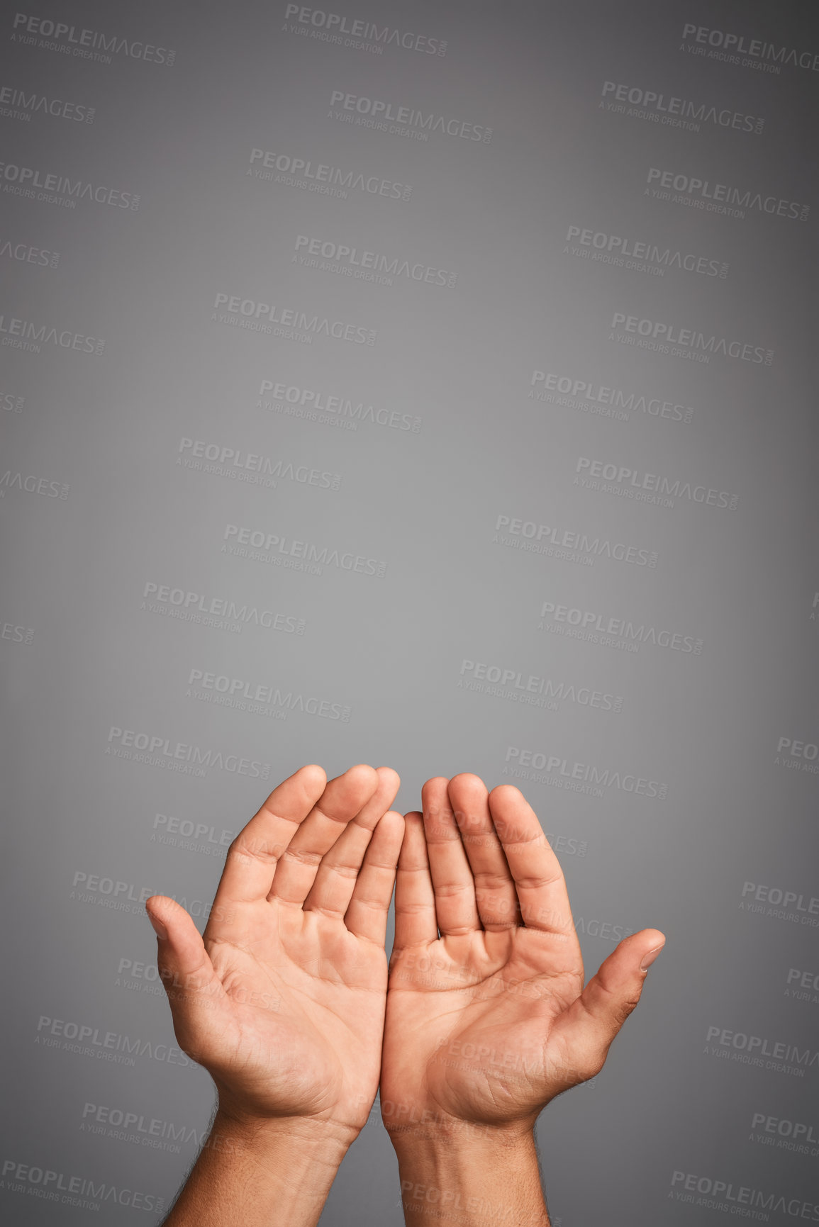 Buy stock photo Hands, prayer and help with person, charity and begging on gray studio background. Closeup, palms or model with gesture, donation or gratitude with mindfulness, nonprofit or mockup space with hope