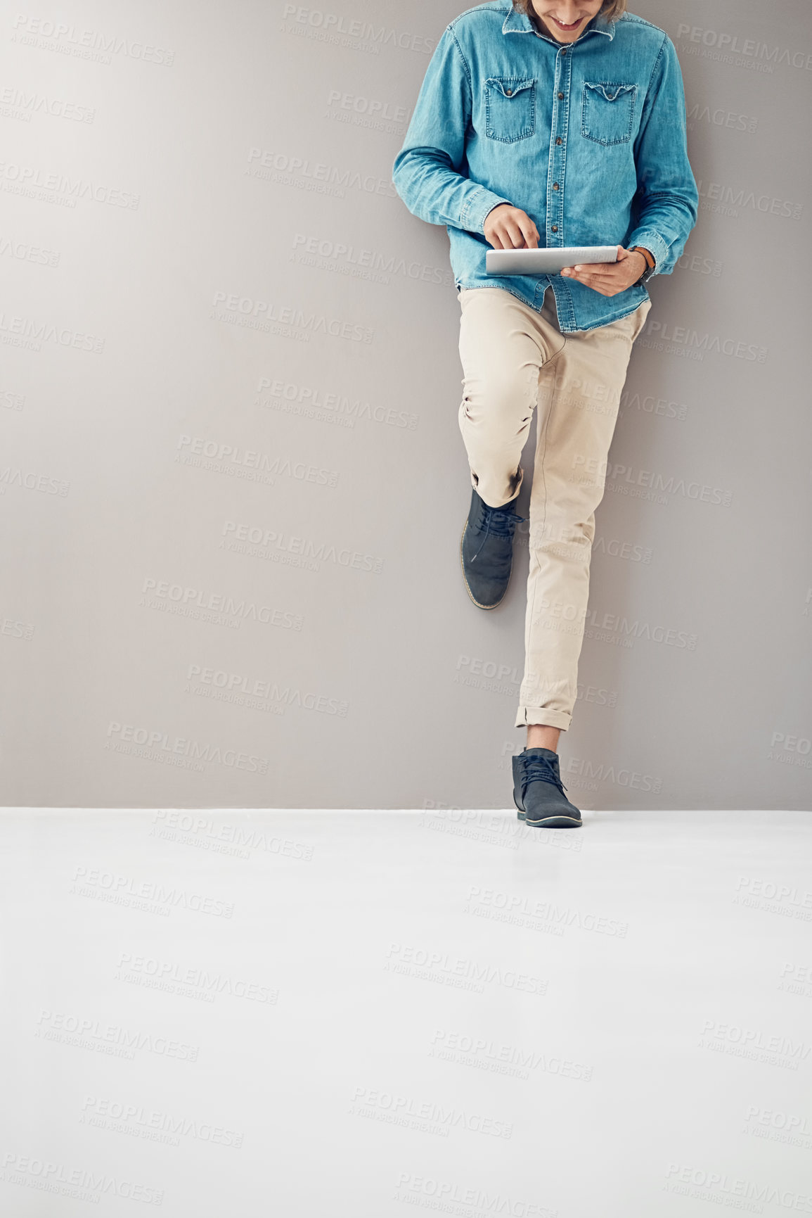 Buy stock photo Hands, tablet and happy business person research, update or check email app on gray wall background. Digital tech, scroll internet or creative ghostwriter work on story blog, project or mockup space