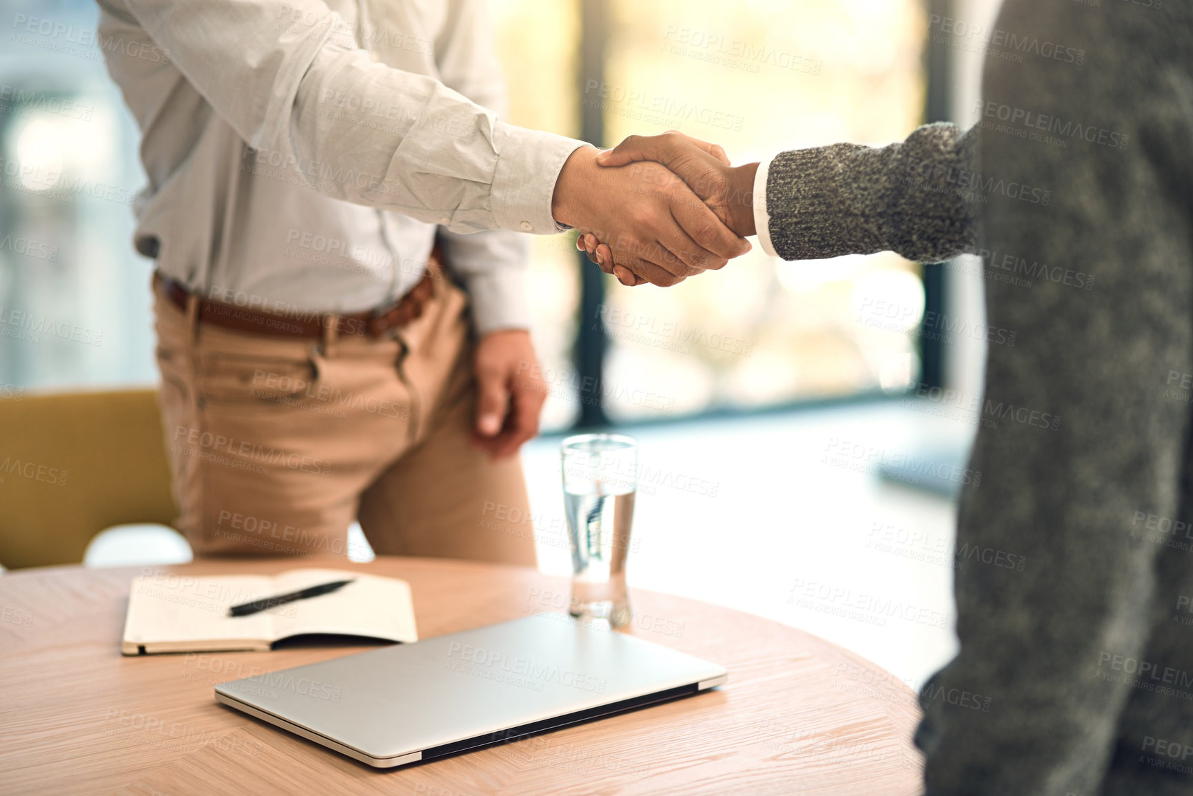 Buy stock photo Businessman, handshake and meeting with intern for interview, hiring or thank you by laptop at office. Closeup of man or employer shaking hands with employee in recruiting or partnership at workplace