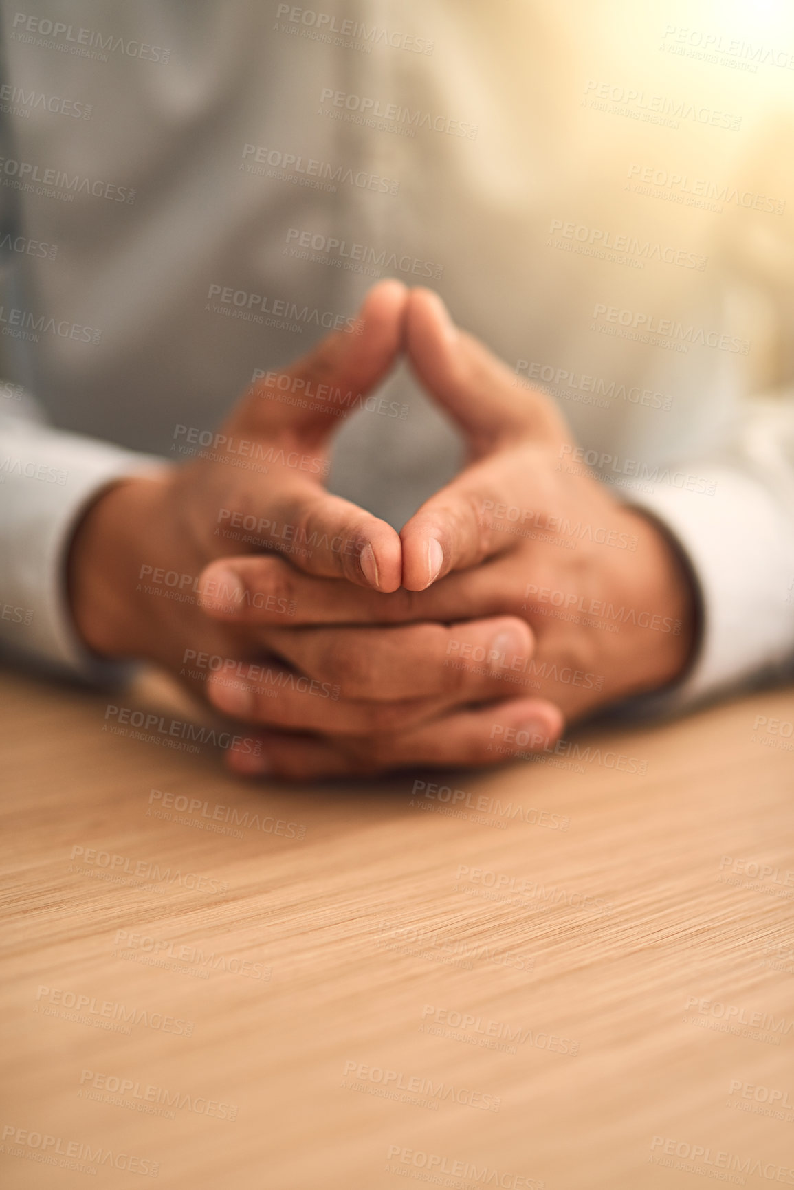 Buy stock photo Hands, together and person at desk, waiting and closeup in negotiation, advice or consultation for career development. Human resources, manager and interview for assessment, recruitment or onboarding