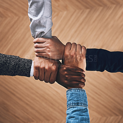 Buy stock photo Collaboration, link or hands of business people with diversity for community support or teamwork in office. Zoom, above or group of employees with joint mission, trust or hope for goals together 