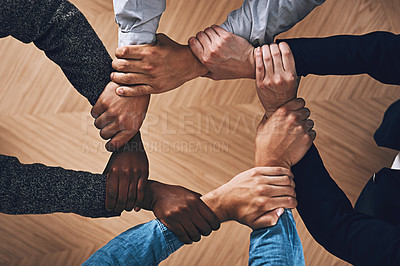 Buy stock photo Solidarity, holding or hands of business people with diversity for group support or teamwork in office. Community, link or above group of employees with mission or team building for goals together 