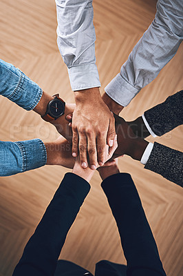 Buy stock photo Teamwork, partnership or hands of business people in support for faith, vision or strategy in office. Above, diversity or employees in group collaboration with hope or mission for goals together 