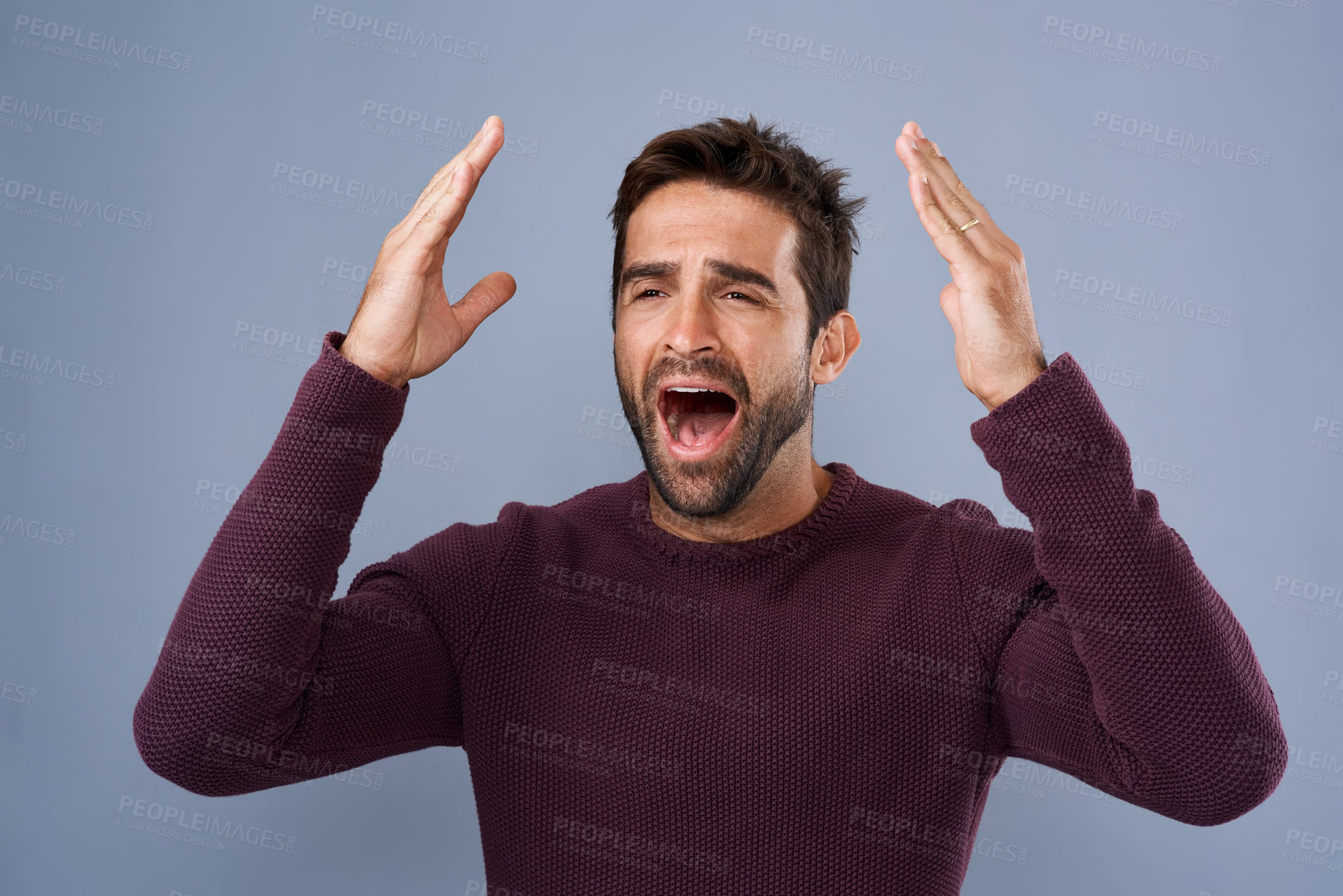 Buy stock photo Studio, anger and man with frustration, yelling and terror of news, scared and secret of phobia. Blue background, screaming and shouting of person, stress and surprise of gossip, anxiety and fear