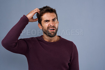 Buy stock photo Doubt, confused and portrait of man with puzzled, uncertain and scratch head on gray background. Thinking, mockup space and face of male person worried for decision, choice and question in studio