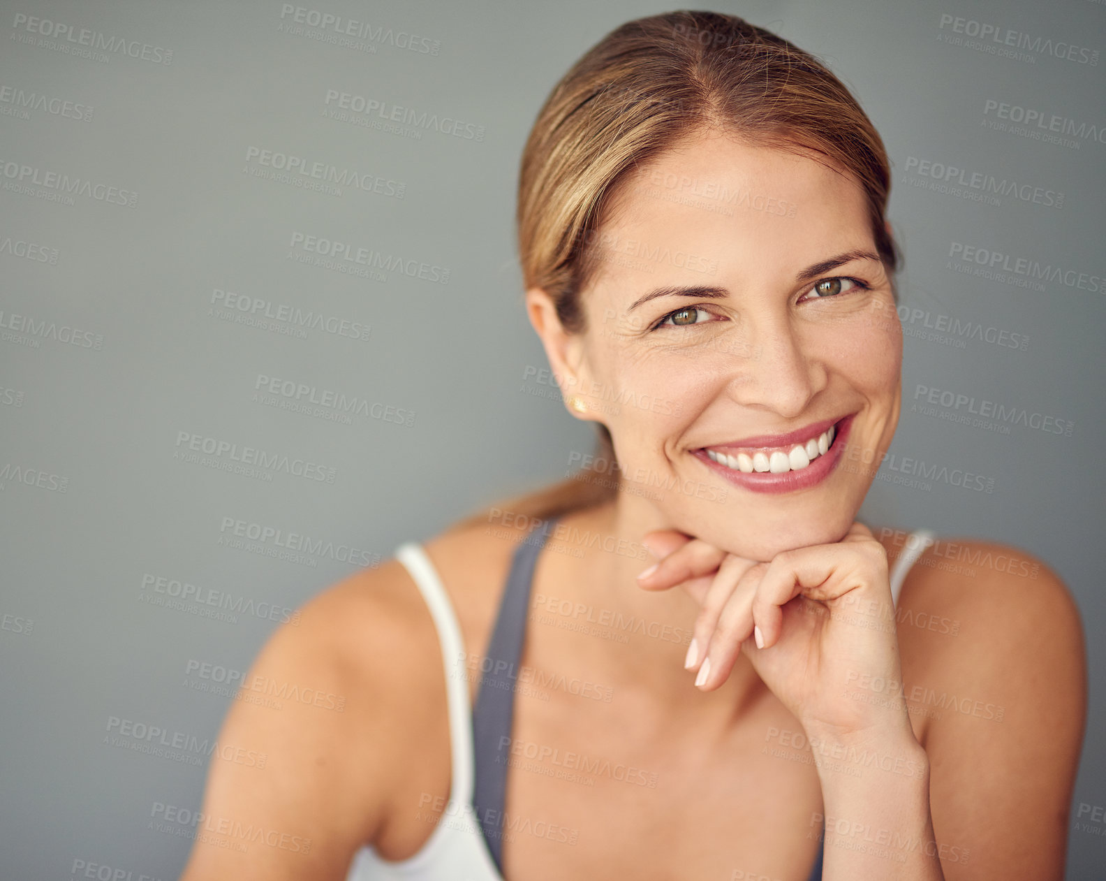 Buy stock photo Portrait, smile and woman with fitness, happiness and healthy person on grey studio background. Face, model and athlete with wellness, mockup space and exercise with training, progress and balance