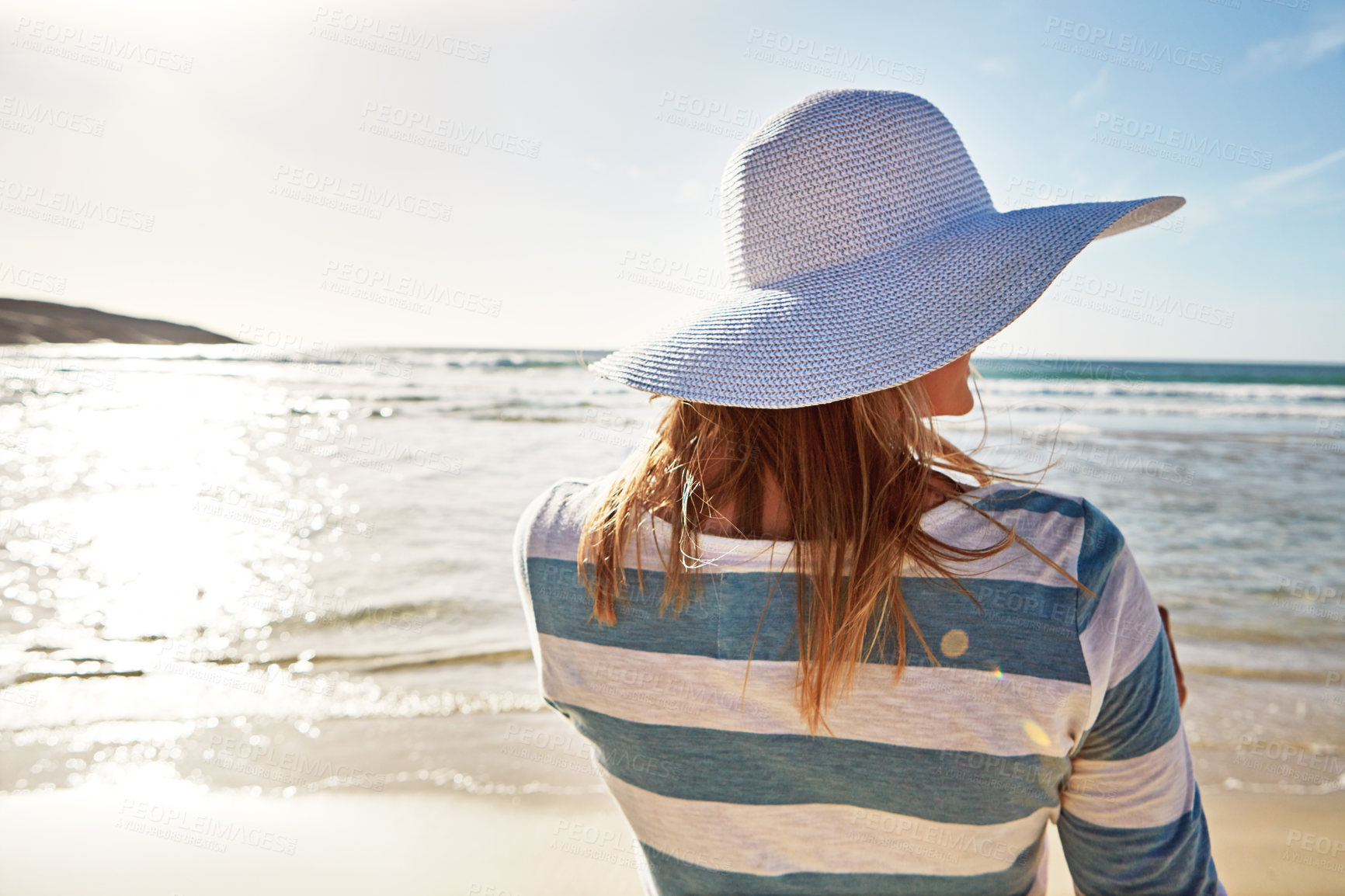 Buy stock photo Woman, back and hat at beach for holiday, fun and break as tourist in Miami. Female person, coast and  in summer vacation for adventure, travel and trip to relax for memories and fresh air in outdoor