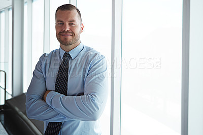 Buy stock photo Portrait of a smiling businessman posing in an airport terminal
