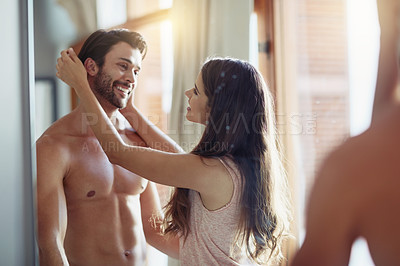 Buy stock photo Cropped shot of an affectionate young couple standing in their bedroom