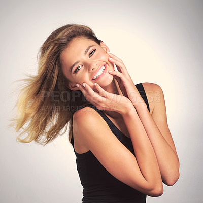 Buy stock photo Hair care, portrait and happy model in studio with keratin treatment for shampoo, cosmetics or wind on white background. Salon, beauty and girl with smile for natural glow, shine or healthy texture