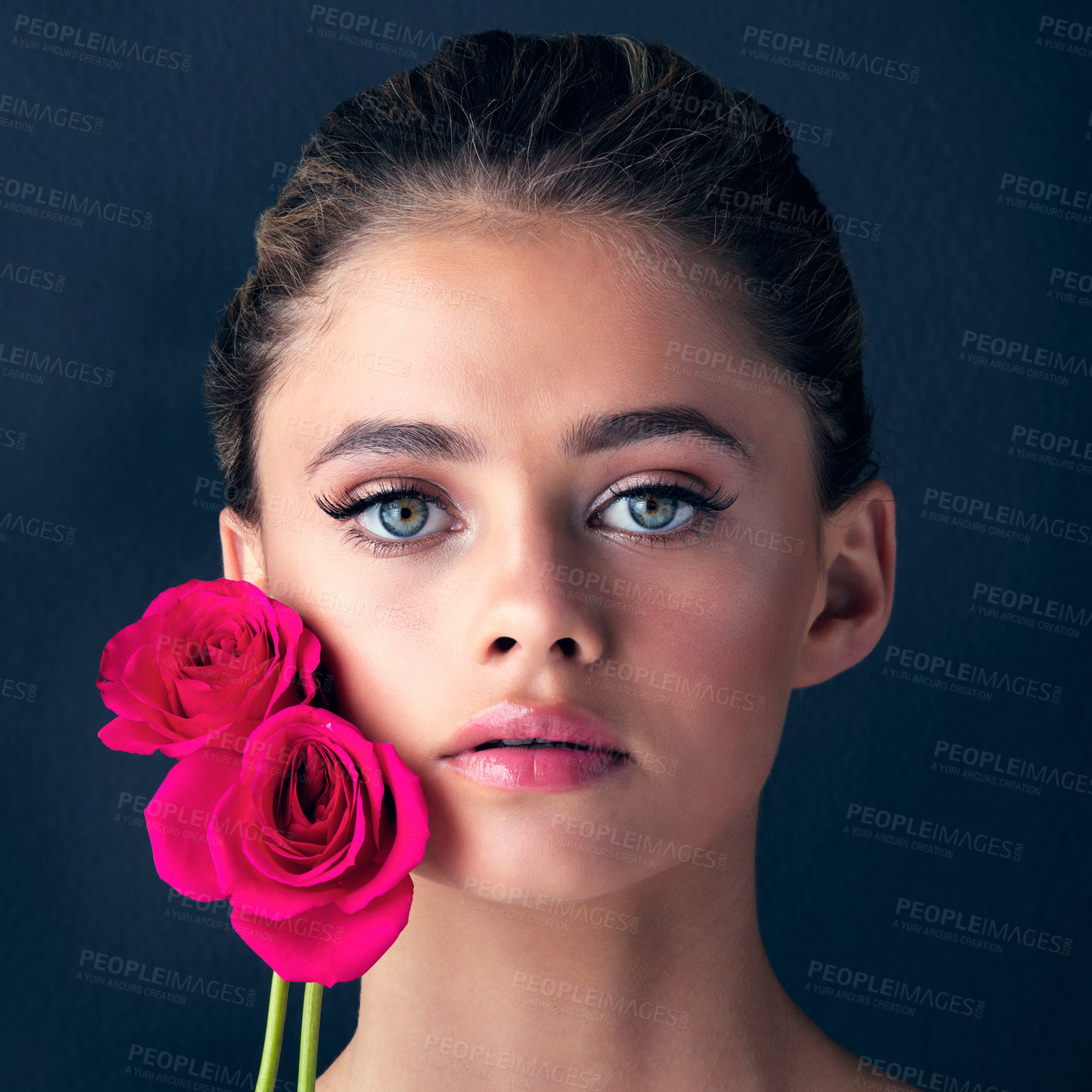 Buy stock photo Roses, portrait or woman with makeup for beauty on dark background for foundation, flowers or glow. Floral, confident model or proud girl in studio for cosmetics, spring aesthetic or skincare results