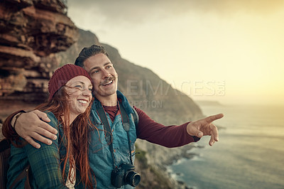 Buy stock photo Smile, couple and pointing on mountain at sea on vacation, holiday or travel together. Happy man, woman and sightseeing at cliff by ocean for adventure, journey or hiking outdoor for view of nature