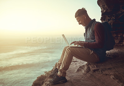 Buy stock photo Nature, laptop and man on cliff by coast for research, wave study or climate change. Outdoor, oceanography and scientist with computer for renewable energy source, water depth or circulation patterns