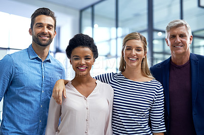 Buy stock photo Portrait of a team of happy colleagues working together in a modern office
