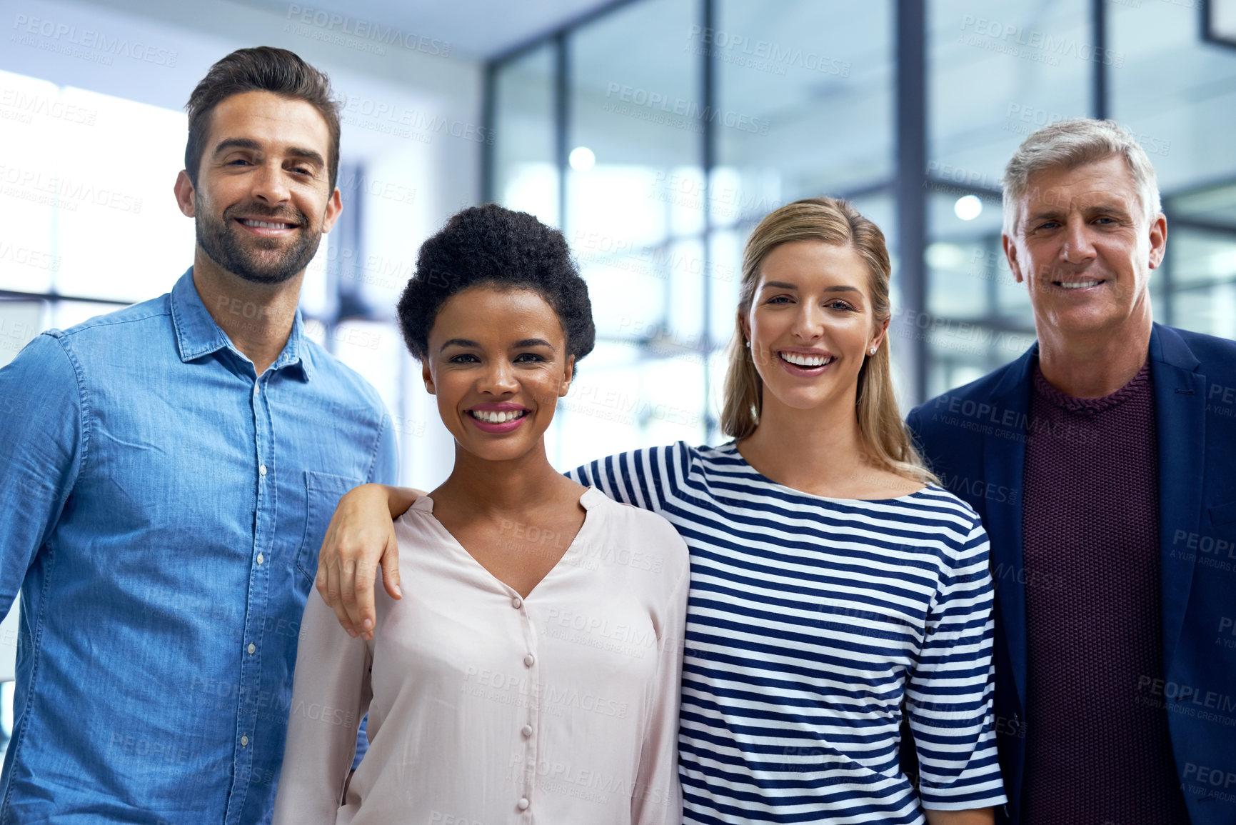 Buy stock photo Portrait of a team of happy colleagues working together in a modern office