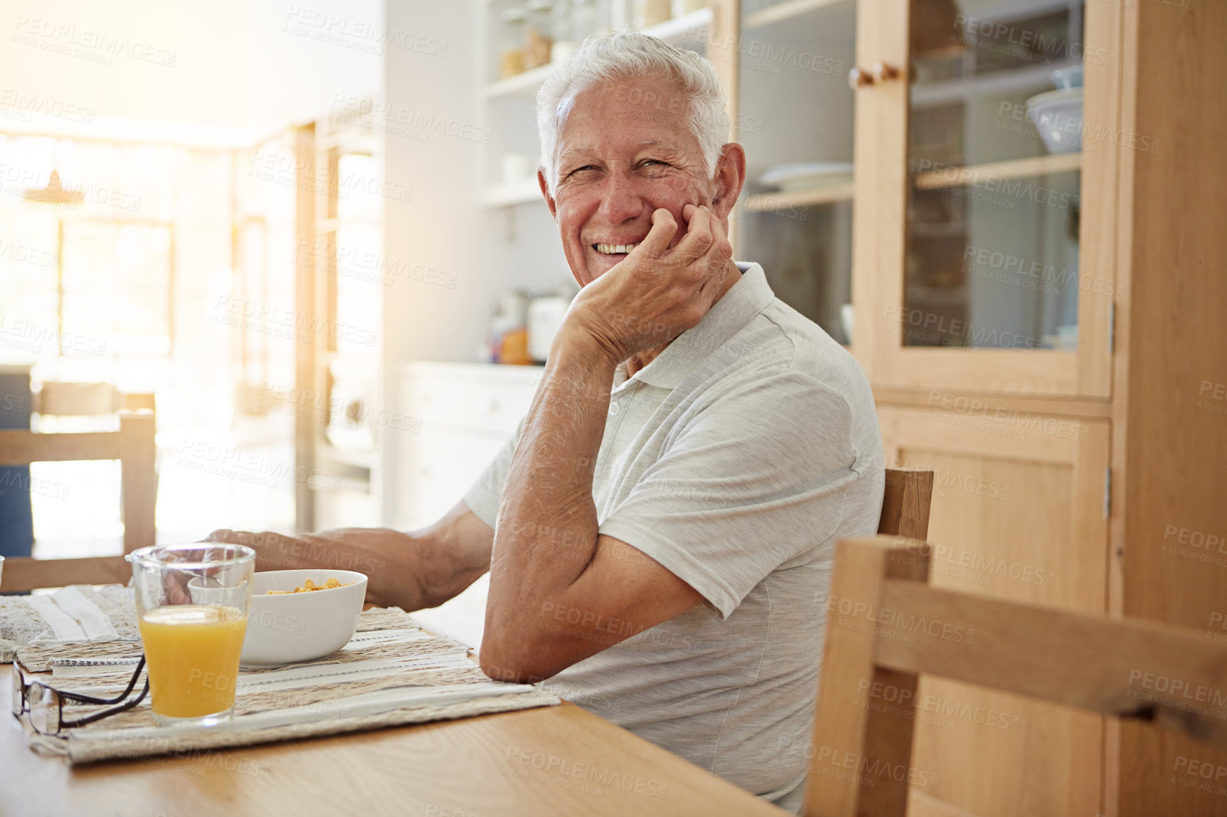 Buy stock photo Elderly, man and happy with portrait at breakfast in dining room for nutrition. healthy meal and retirement. Senior, person and smile in home with cereal, relax and morning routine in apartment