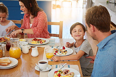 Buy stock photo Food, breakfast and a playful family in the dining room of their home together for health or nutrition. Mother, father and cute sibling kids eating at a table in their apartment for love or bonding