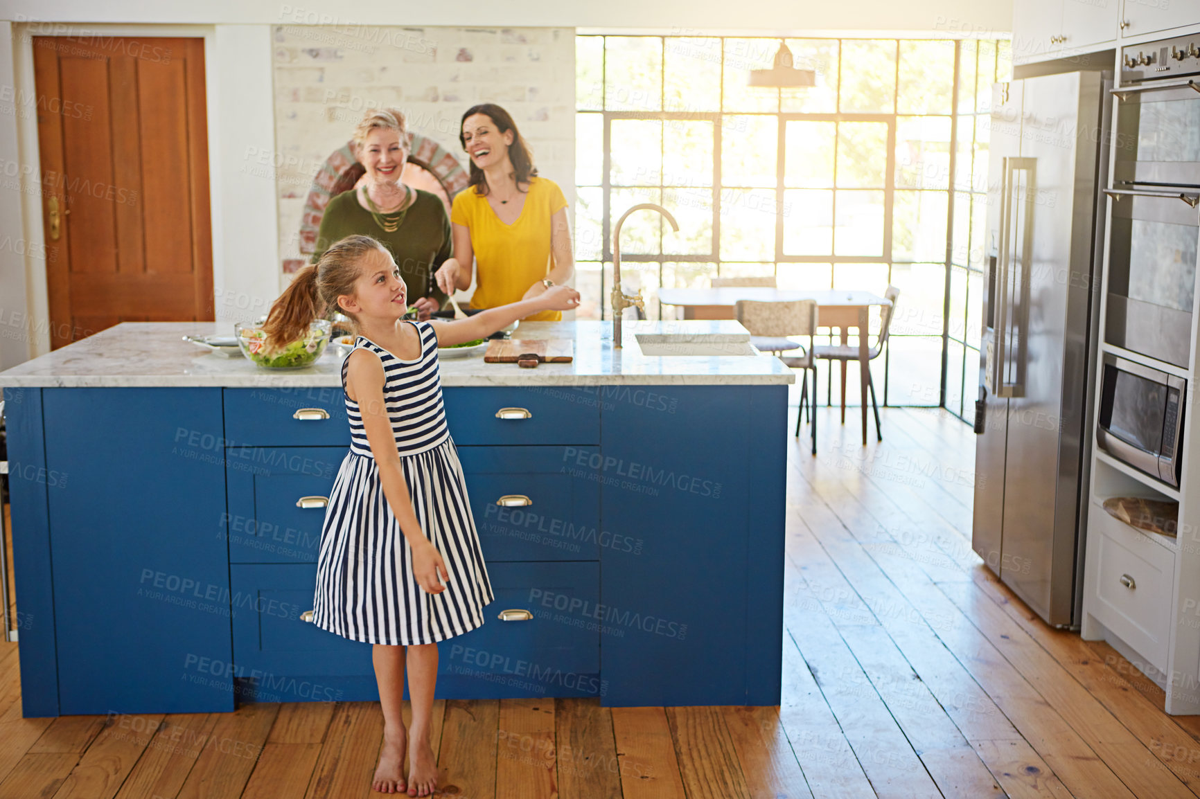 Buy stock photo Happy, dancing and child in kitchen with laughing, fun and family with mom and grandmother cooking. Love, youth and girl with senior woman, funny and together with food and smile with care in house