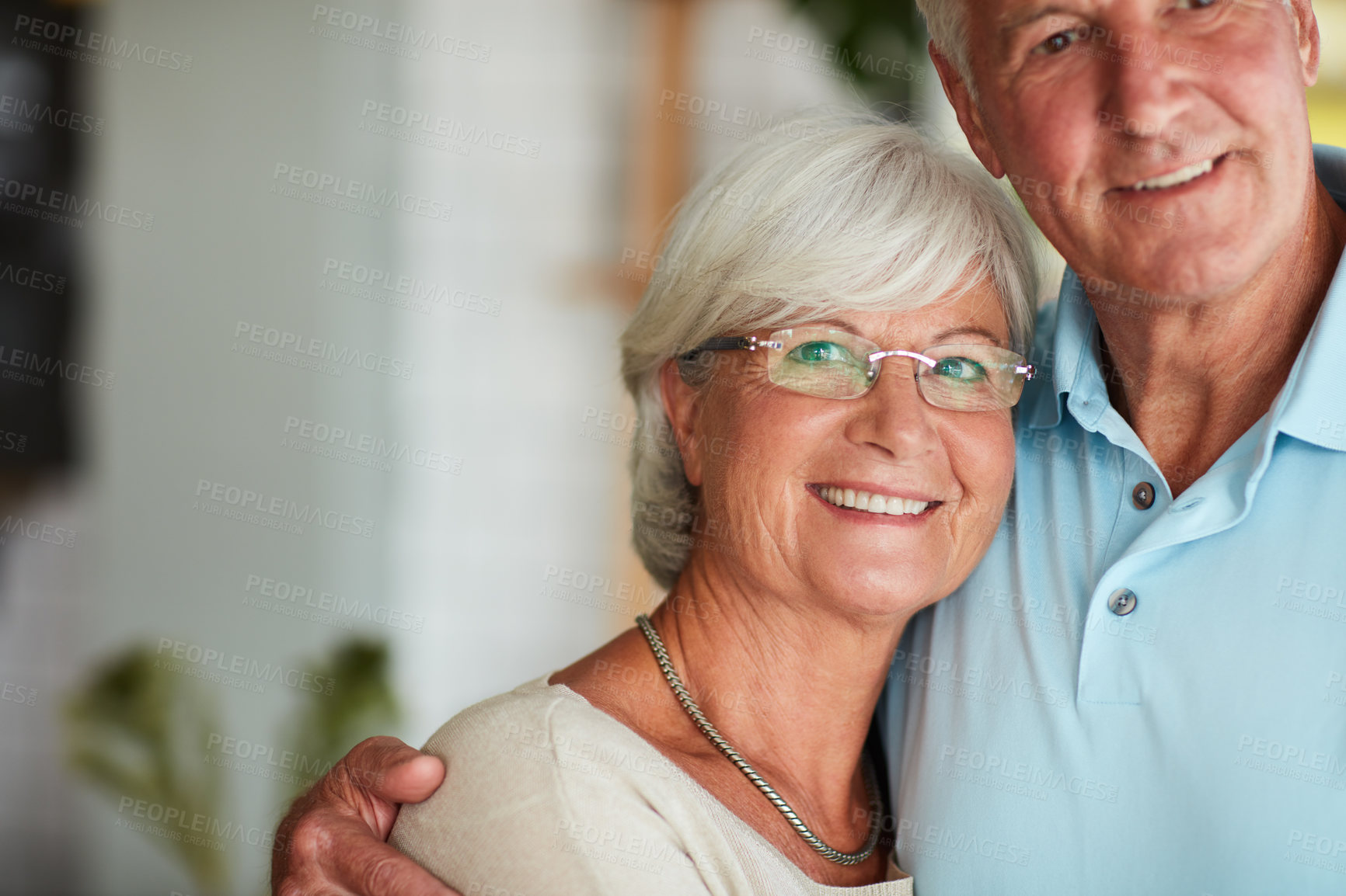 Buy stock photo Love, hug or elderly couple in house with smile, healthy relationship or commitment in retirement. Connection, portrait or old people with embrace, bonding together or romantic moment at home.