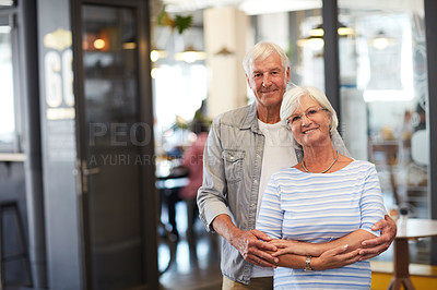 Buy stock photo Portrait of a happy senior couple standing together in a coffee shop