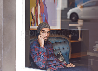 Buy stock photo Phone call, serious and man by cafe window for communication, conversation or networking. Confident, technology and person talking for mobile discussion with cellphone in coffee shop or restaurant.