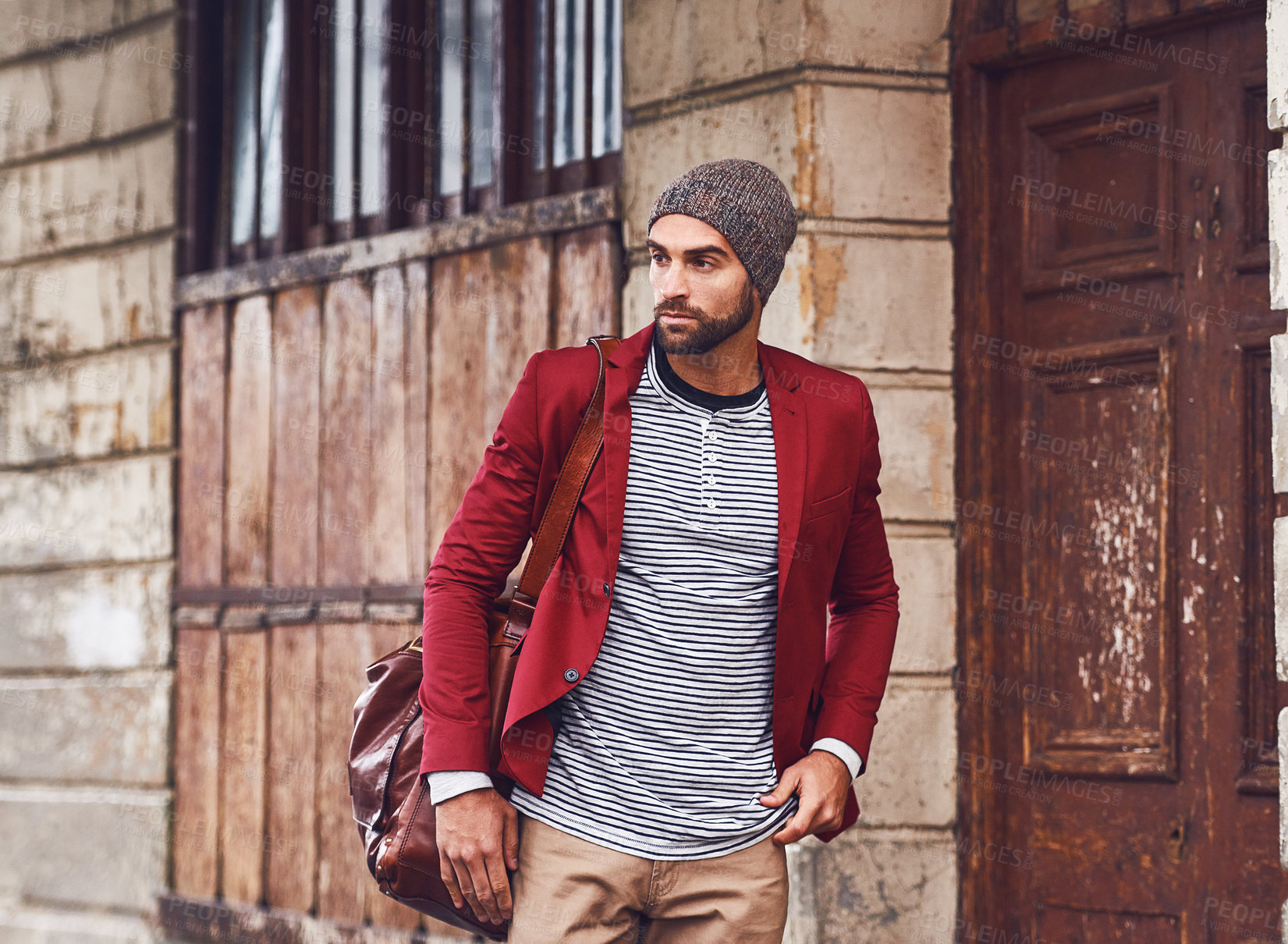 Buy stock photo Fashion, walking and man in city for travel on sightseeing vacation, adventure or holiday. Retro, bag and male person with cool, trendy and winter style for outfit in urban town for weekend trip.