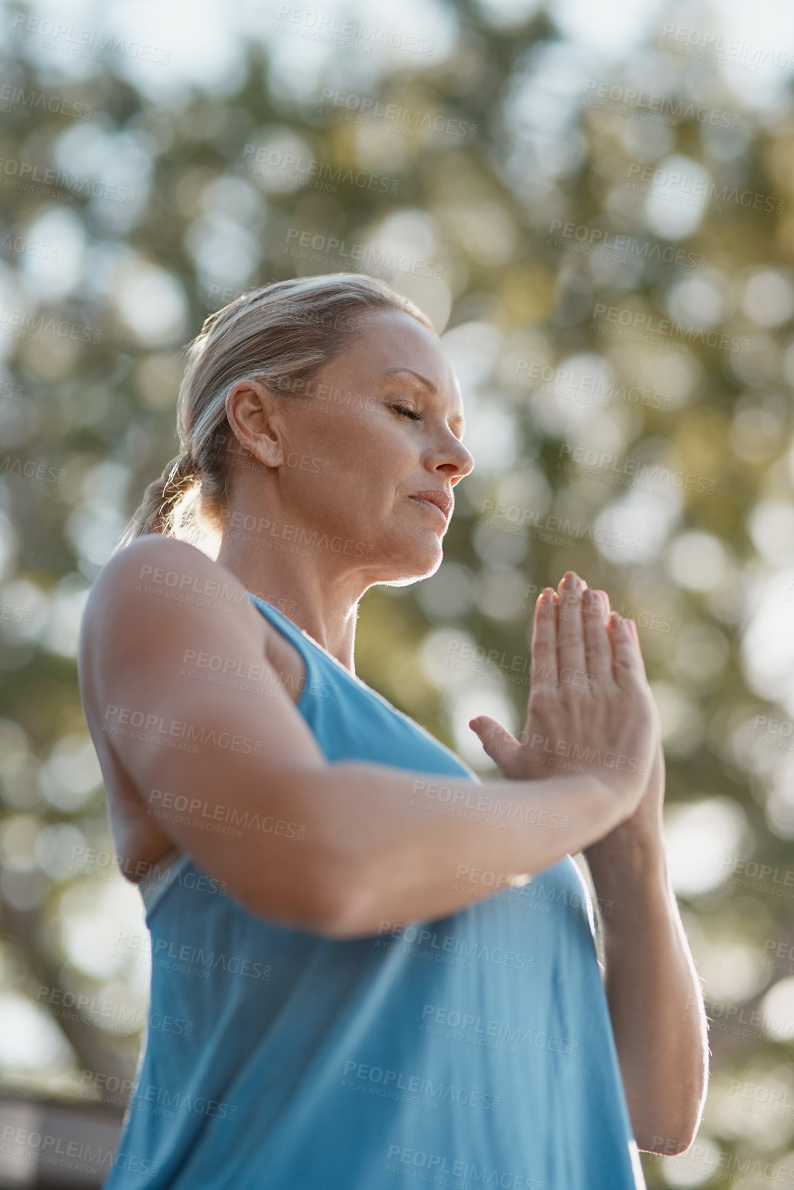 Buy stock photo Nature, yoga and woman with prayer hands for meditation, peace and mindfulness in low angle. Namaste, mature person and relax at park for calm, zen and breathing to exercise healthy body for wellness