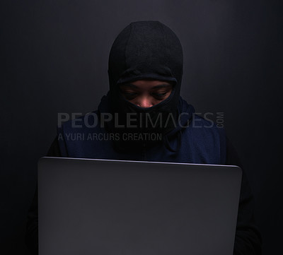 Buy stock photo Cybersecurity, hacker and man with laptop in studio for information technology, crime and fraud. Network, risk and programming with cyber attack for database, firewall and malware on black background