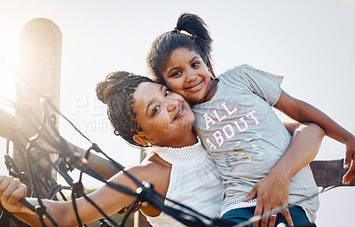 Buy stock photo Portrait of a mother bonding with her daughter at the park
