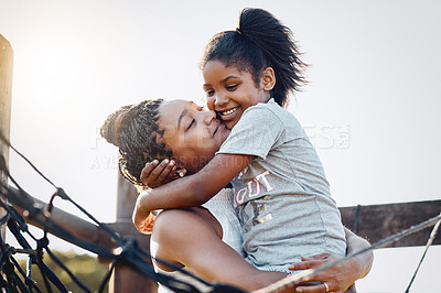 Buy stock photo Cropped shot of a mother bonding with her daughter at the park