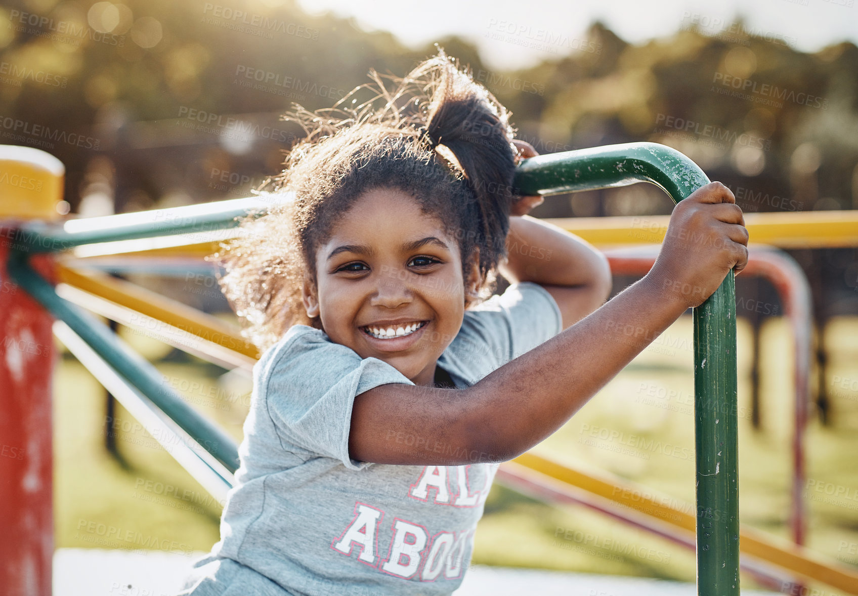 Buy stock photo Portrait, girl and carousel with playground, fun and love for summer break and play. Kid, obstacle course and park equipment for joy, outside and happy child smile with countryside merry go round