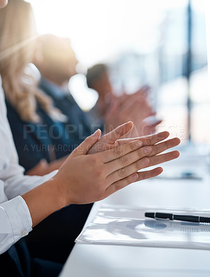 Buy stock photo Cropped shot of a group of unrecognizable businesspeople applauding during a business presentation