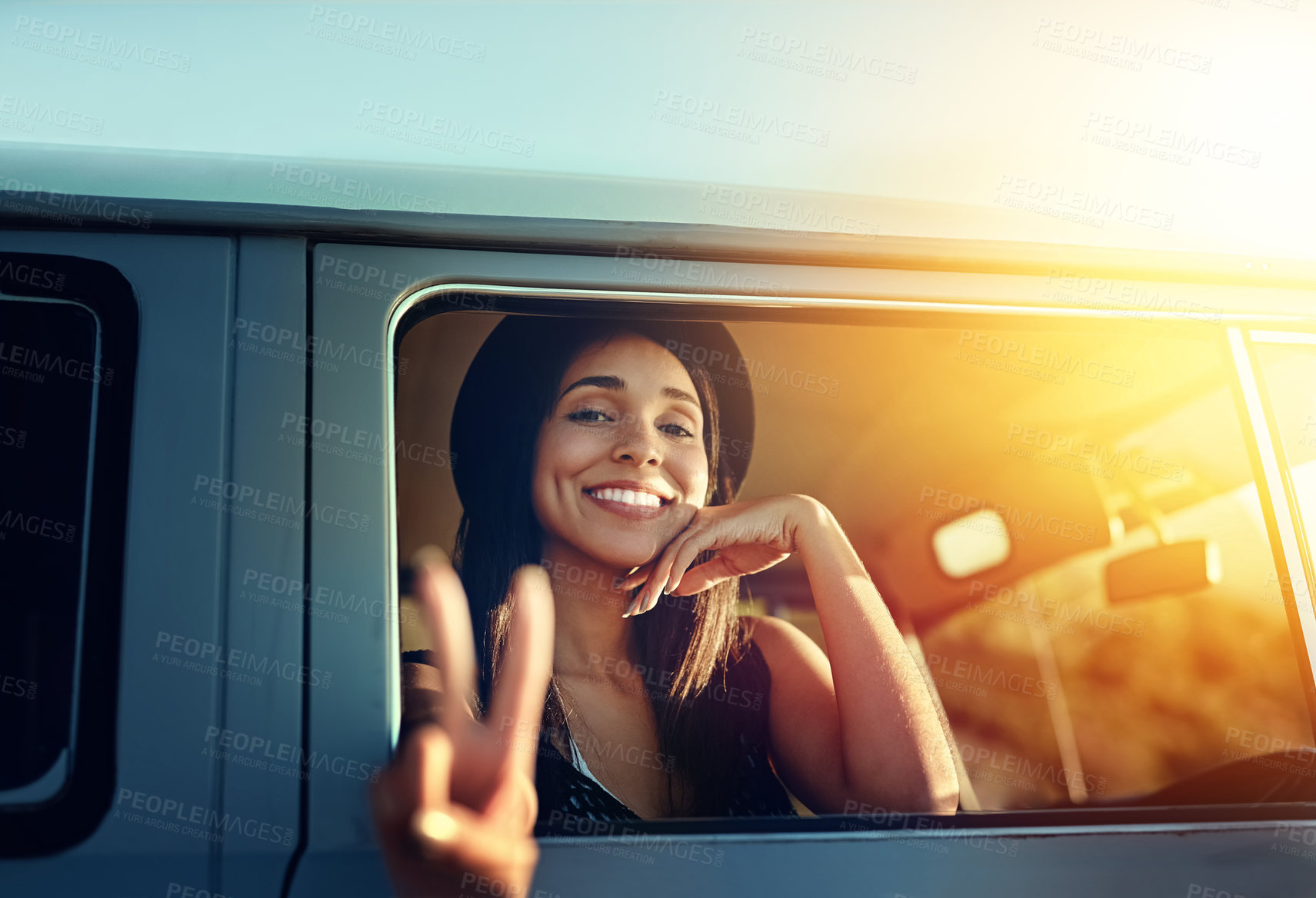 Buy stock photo Peace sign, portrait and window with woman on road trip for holiday, travel or weekend getaway. Emoji, hand gesture and smile of happy person in car for drive, trip or vacation to remote destination