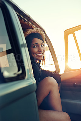 Buy stock photo Shot of a young woman enjoying a relaxing roadtrip